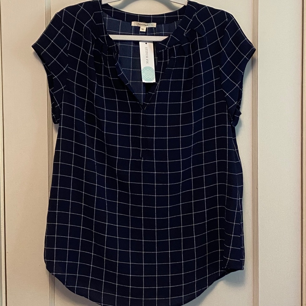 Navy and white shirt sleeved blouse